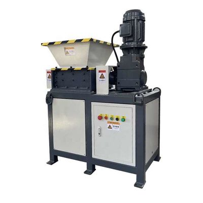 Macchine di triturazione dei rifiuti di materiali tessili e di piccoli metalli Macchine di triturazione dei rifiuti di cartone